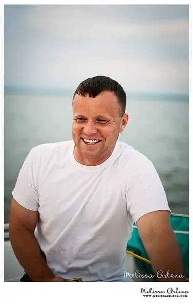 laughing guy on sailboat